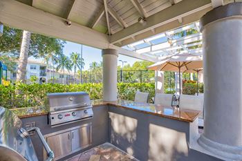 Exclusive bbq grill island located at the swimming pool