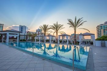 Sky-high lap pool, hot tub & private cabanas