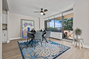 Southfield apartment for rent - A dining room with a table set for four.