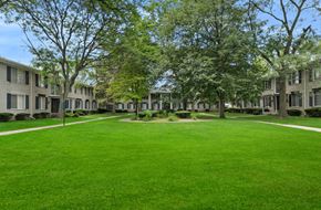 Southfield apartment for rent - A grassy area in front of apartment buildings.