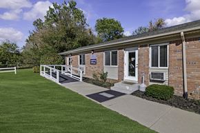 Ypsilanti apartment for rent - A brick building with a sign that says "Emergency Room" on it.