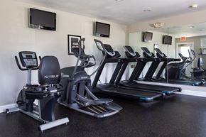 Urbana apartment for rent - A gym with treadmills and exercise bikes.