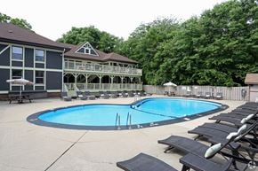 Decatur apartment for rent - A pool with a deck and sun loungers.