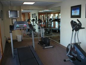 Topeka apartment for rent - A well-equipped fitness center at Cedar Ridge Apartments.