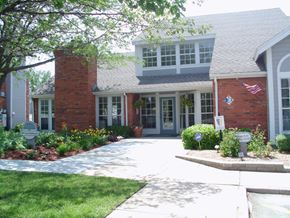Wichita apartment for rent - Front view of the Northpark Apartments clubhouse with well-kept landscaping.
