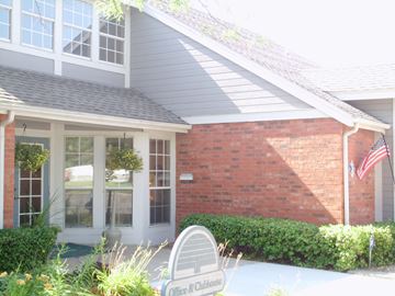 Wichita apartment for rent - the exterior of a house with a mailbox in front of it