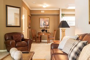 Overland Park apartment for rent - A thoughtfully designed living room in an apartment at Enclave at Town Center, featuring a flexible layout.