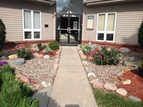 Omaha apartment for rent - Front entrance of the clubhouse at Muirfield Apartments complex.