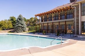 Overland Park apartment for rent - A peaceful pool area at Regent’s Walk Apartment Homes, perfect for leisure and fun.
