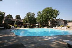 Omaha apartment for rent - A swimming pool at Eden West, surrounded by a calm and inviting atmosphere.