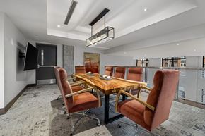 Durham apartment for rent - a dining room with a wooden table and leather chairs