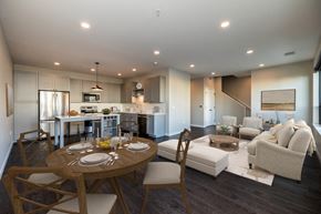 Rochester apartment for rent - a kitchen and living room with a table and chairs
