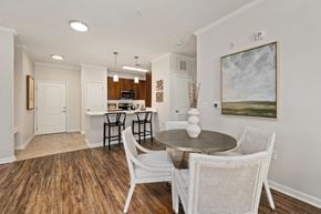 Raleigh apartment for rent - A dining room with a table and chairs.