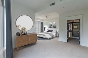 Charlotte apartment for rent - a bedroom with a bed and a dresser in a room