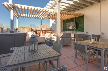 Rooftop deck with outdoor kitchen and seating