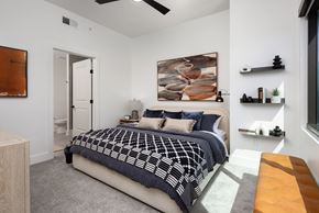Atlanta apartment for rent - a bedroom with a bed and a ceiling fan