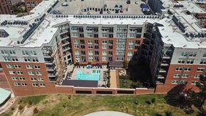 Durham apartment for rent - an aerial view of a large building with a swimming pool