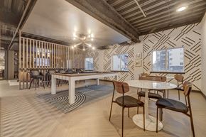 Salt Lake City apartment for rent - a dining room with tables and chairs and a large table with chairs