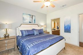 Windermere apartment for rent - a bedroom with a bed and a ceiling fan