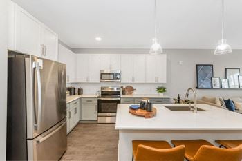 Quartz countertops in kitchen and bath