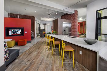 Social hub equipped with wi-fi, imacs, powered individual and communal work spaces, tv’s, billiards, ping pong, shuffleboard, foosball, darts, arcade game, and more.