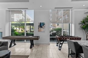 Baltimore apartment for rent - a game room with a foosball table and a pool table