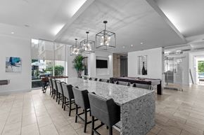 Baltimore apartment for rent - the dining room has a large granite counter top and a billiards table