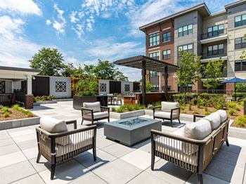 Outdoor lounge area with fireplace