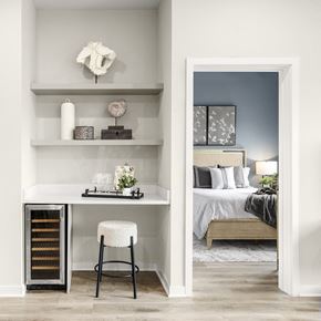 Chatham apartment for rent - a bedroom with a bed and a desk with a stool at The Ivy, Chatham, NJ
