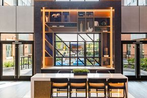Jersey City apartment for rent - a dining room with a table and chairs in front of a window at 100 House Apartments, Jersey City , New Jersey