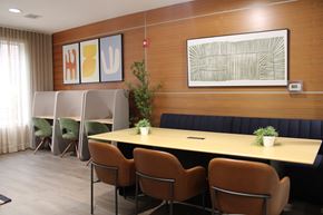Harrison apartment for rent - A conference room with a long table and chairs.