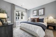 Hillsdale apartment for rent - A bedroom with a large bed and two lamps.