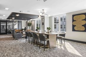Hillsdale apartment for rent - Community workspace with communal table and lounge seating at The Piermont Apartments, Hillsdale, 07642