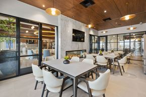 Pearl River apartment for rent - A modern dining room with a large table and chairs at The Reserve at Pearl River Apartments, New York, 10965