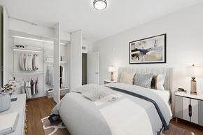 Washington apartment for rent - a bedroom with a bed and a closet