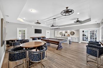 Recreation room with billiards table and kitchenette