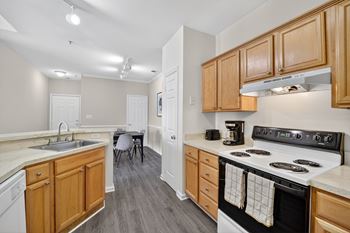 Fully-equipped kitchen with microwave, dishwasher, and breakfast bar available*