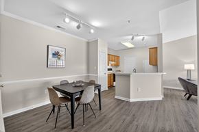 Spotsylvania apartment for rent - A classic style dining room with a table and chairs is shown.