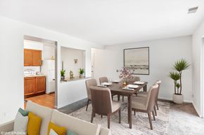 Washington apartment for rent - a living room and dining room with a table and chairs