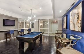 Washington apartment for rent - A room with a pool table and chairs.
