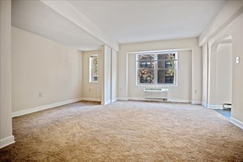 Wall to wall carpeting in living and bedroom areas