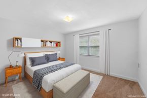 Silver Spring apartment for rent - a white bedroom with a bed and a window in Croydon Manor apartment