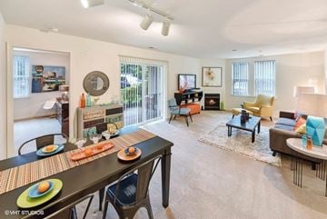 Frederick apartment for rent - a living room and dining room with a table and chairs