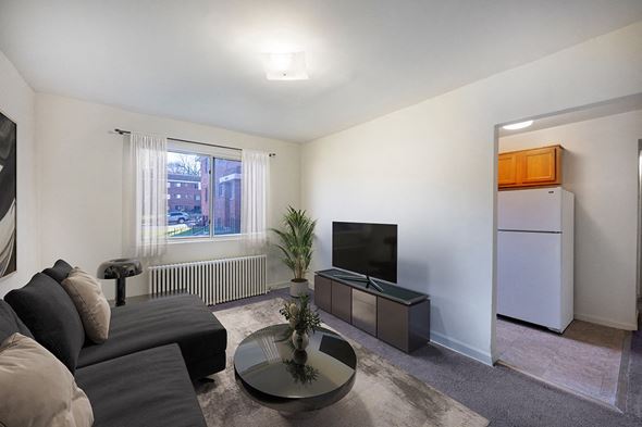 Washington apartment for rent - a living room with a couch and a coffee table