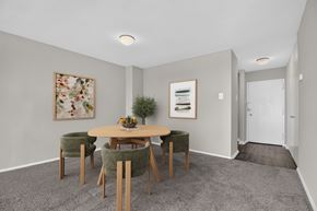 Hyattsville apartment for rent - A dining room with a round table and chairs.