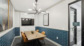 Raleigh apartment for rent - A dining room with a wooden table and chairs at Vintage Raleigh West Apartments, Raleigh
