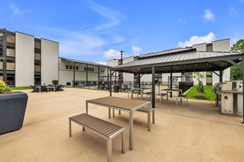 Grilling pavilion with tables and outdoor lighting