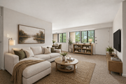 College Park apartment for rent - A living room with a couch, a coffee table, and a painting on the wall.