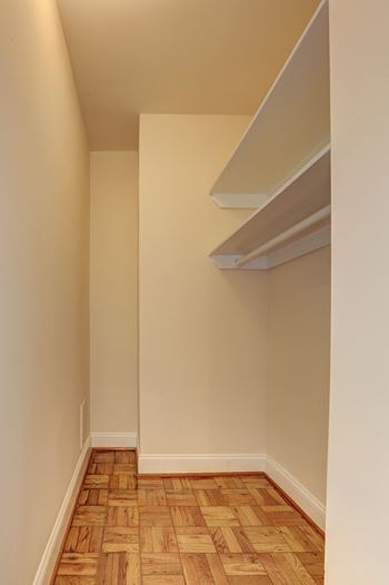 Generous walk-in closets with shelving