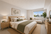 Silver Spring apartment for rent - A bedroom with a large bed and a window overlooking a building.